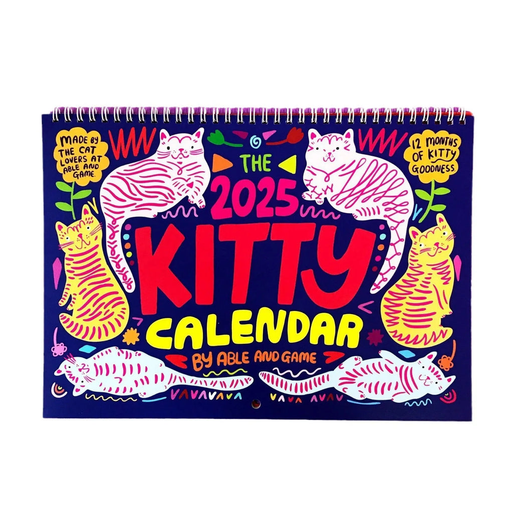 Cat Calendar Wall Planner for 2024 or 2025 with seasonal designs on paper.