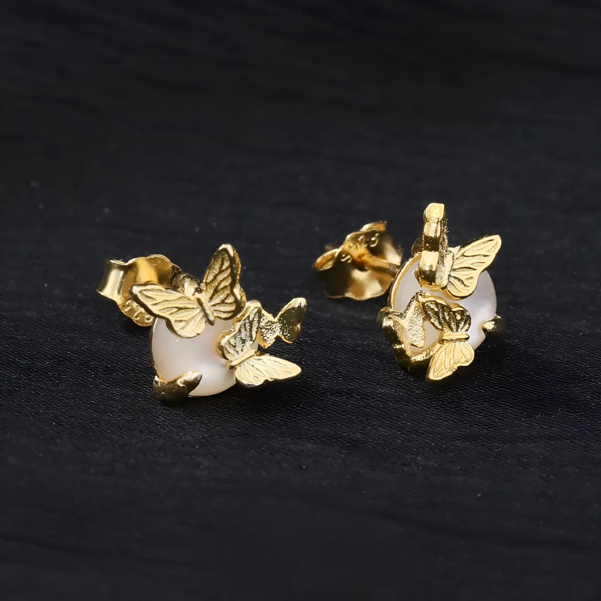 Butterfly design ear studs in 925 silver with electroplated gold or white gold colour finishes