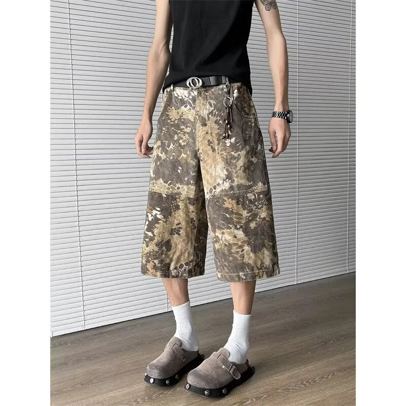 Yellow snake pattern camouflage cotton denim jeans with cropped length and distressed detailing