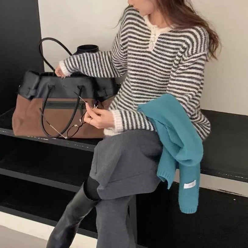 Women's striped cashmere pullover sweater in red with loose fit and plaid pattern