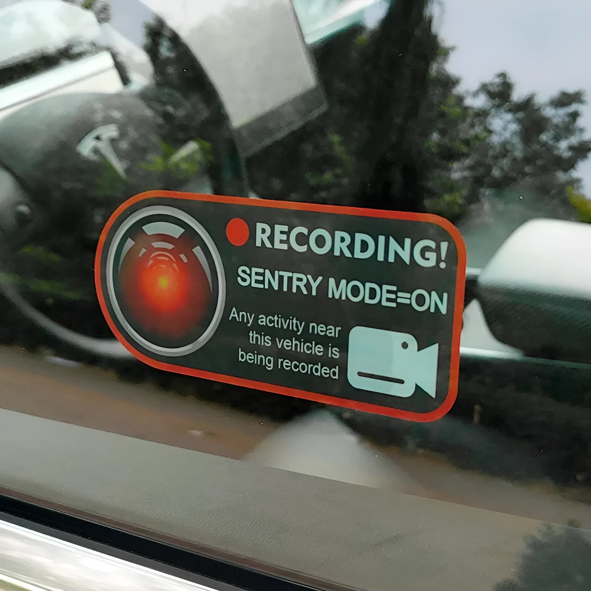 Pair of white rectangular electrostatic warning stickers for Tesla Sentry Mode, measuring 11cm by 5cm.