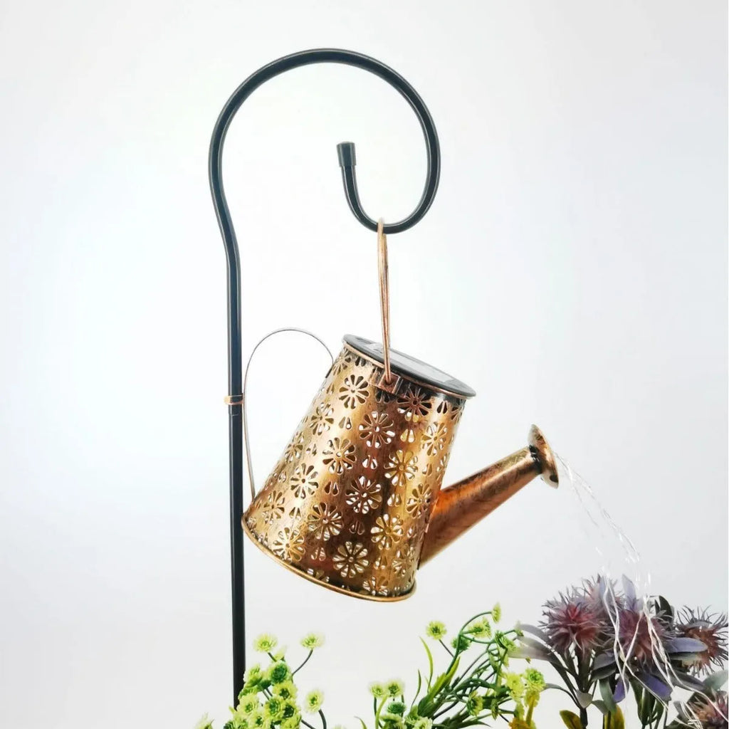 Solar-powered butterfly kettle garden light with wrought iron construction and solar panel
