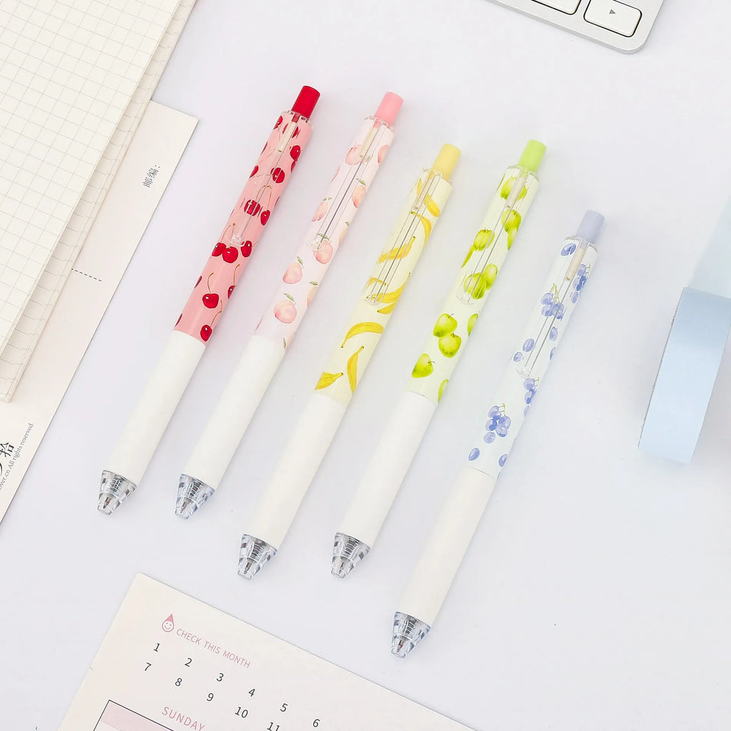 Three scented fruit-designed press-action pens with 0.5mm quick-drying black refills