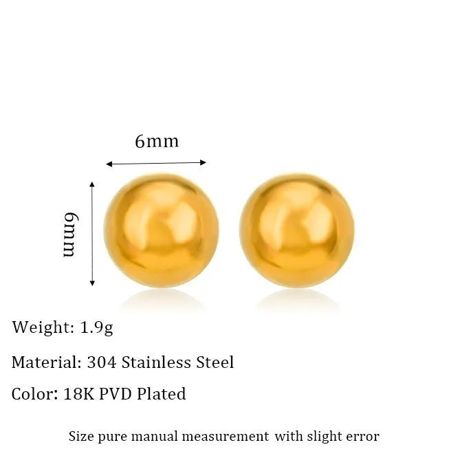 Stainless steel ball stud earrings in gold and silver finishes on a grey background.