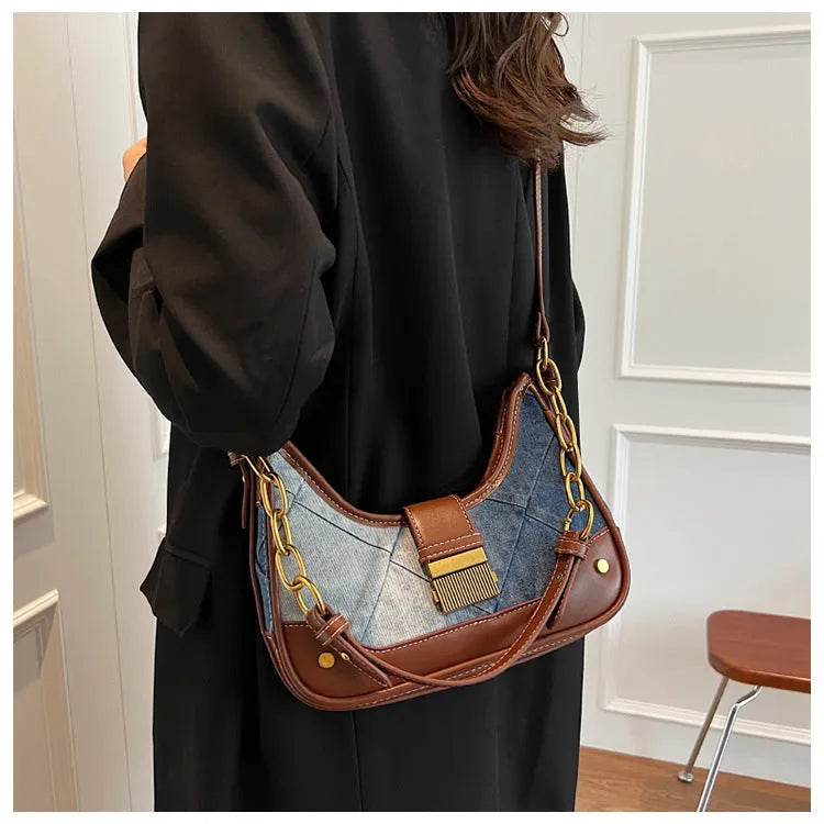 Brown denim women's shoulder bag with diamond mesh and chain details showing internal mobile phone pocket