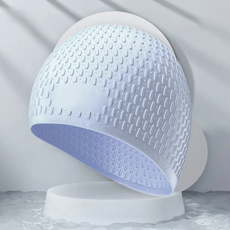 Adult silicone swimming cap with water drop design in various solid colours