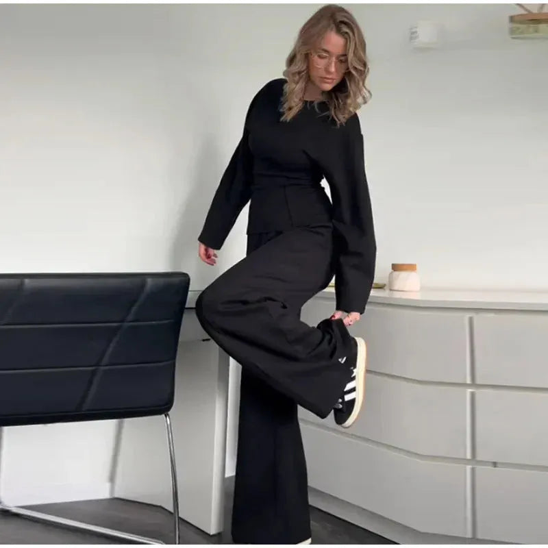 Women's black polar fleece suit with long sleeve O-neck top and wide leg trousers