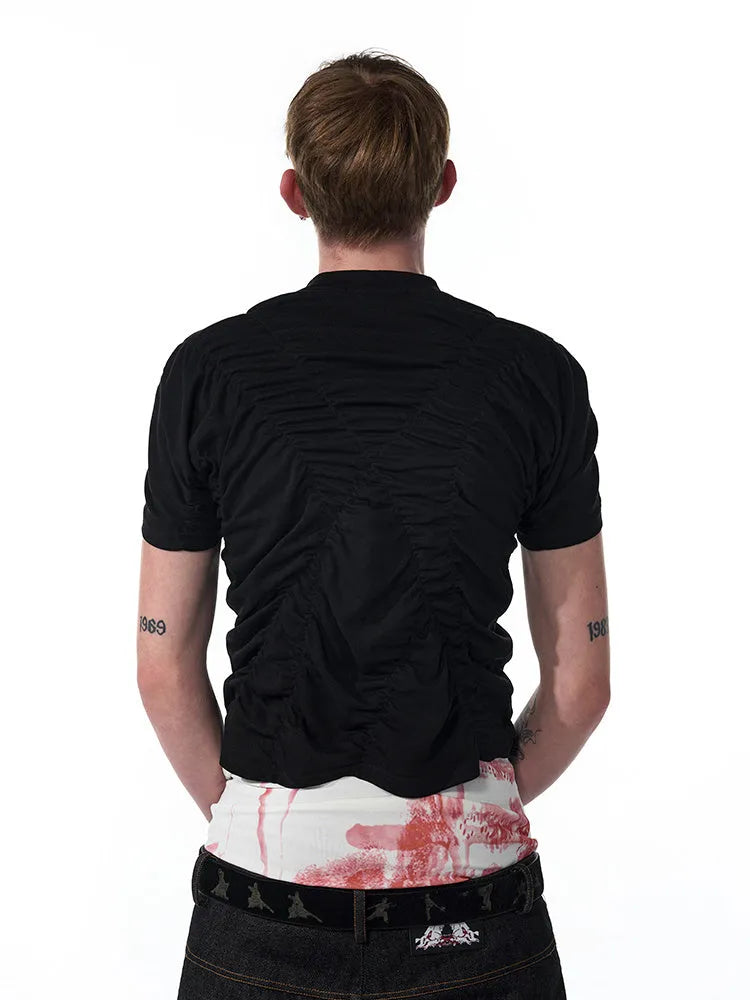 Black men's slim fit printed short sleeve T-shirt with round neck on a man.