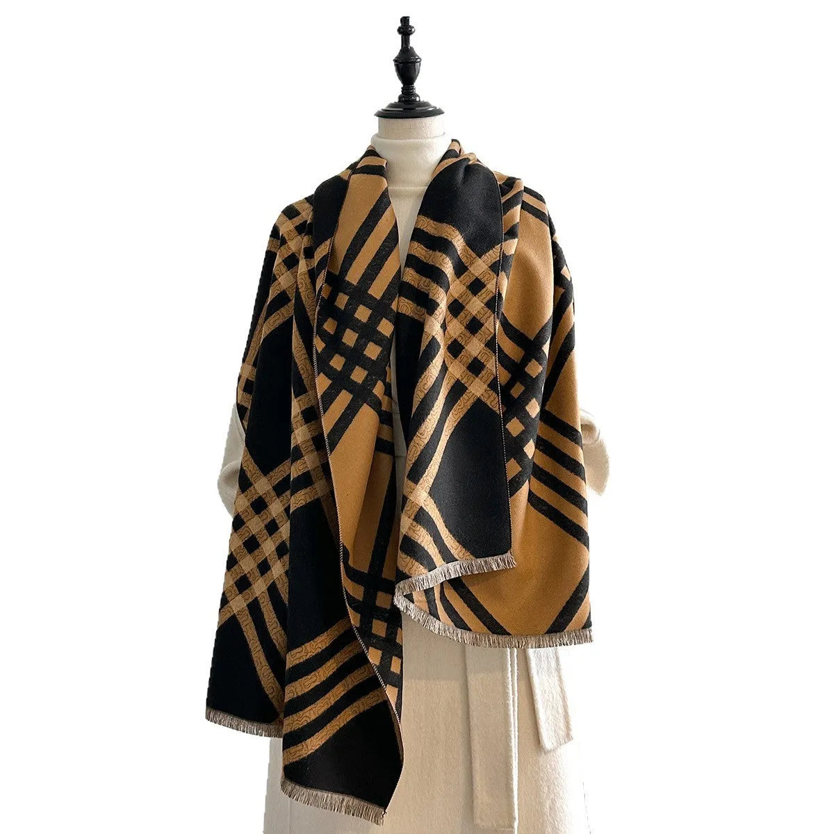 Long brown imitation cashmere scarf with tassel ends laid flat showing 185cm length