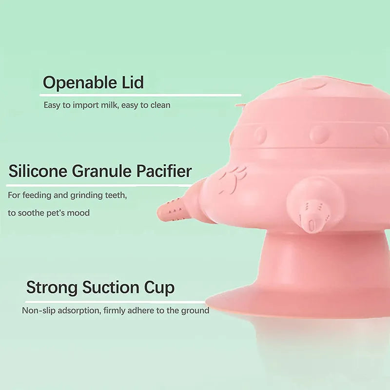 Pink silicone pet nursing bottle with bionic teat and wide base for feeding puppies and kittens.