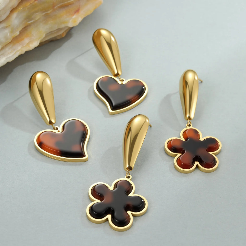Women's tortoiseshell resin hawksbill colour earrings in heart and flower geometric designs on 18K electroplated stainless steel.