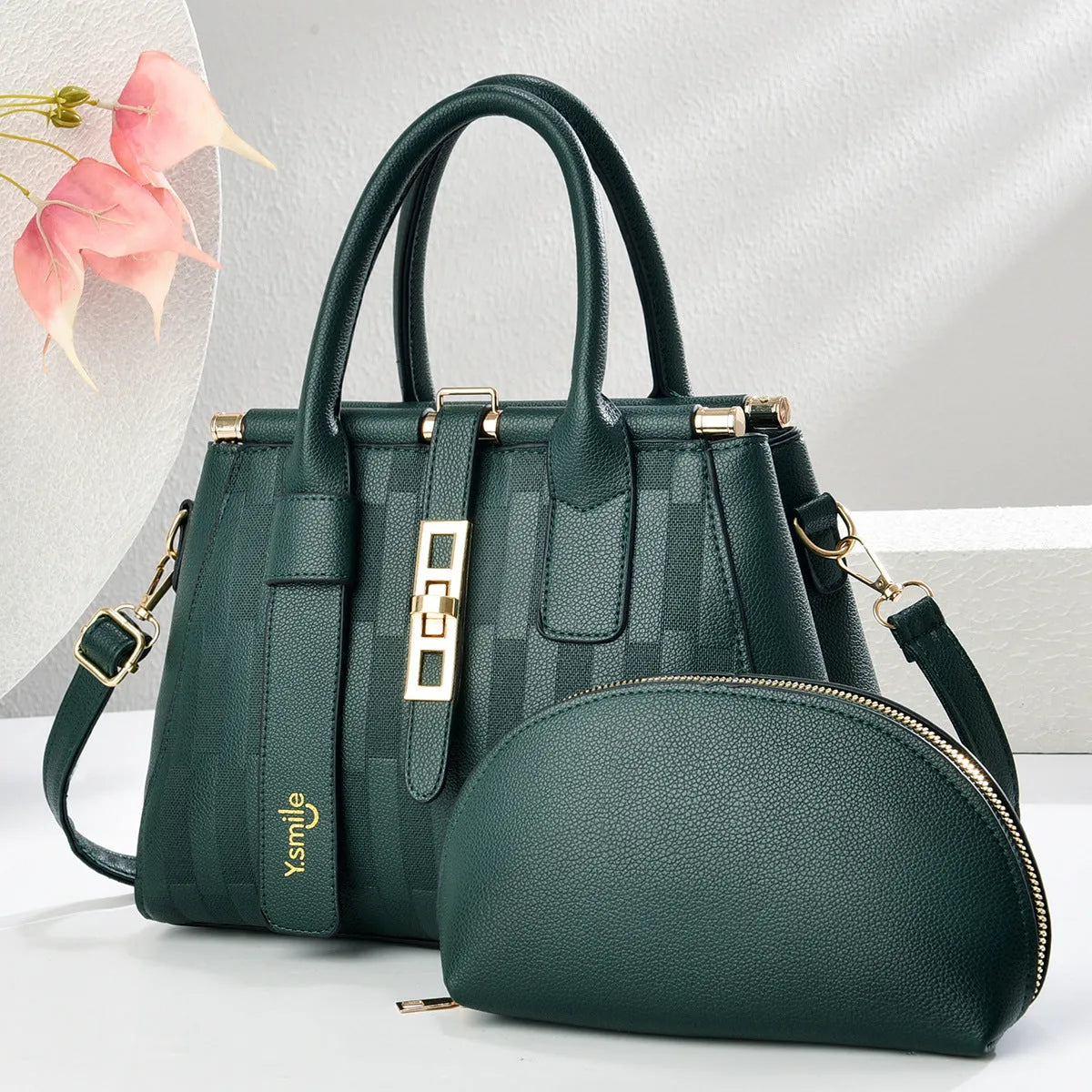 Round PU leather crossbody handbag in light khaki colour showing front view and adjustable shoulder strap.