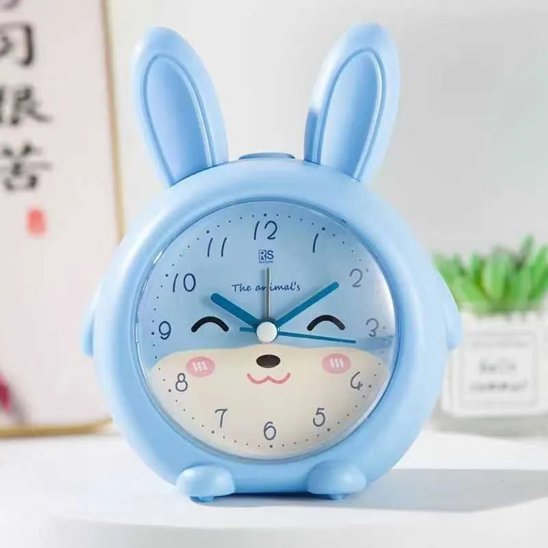 Children's cartoon style alarm clock with singing function, night light, and multiple alert modes in pink and blue colours