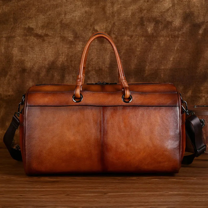 Handmade retro leather bag in vintage brown with large capacity.