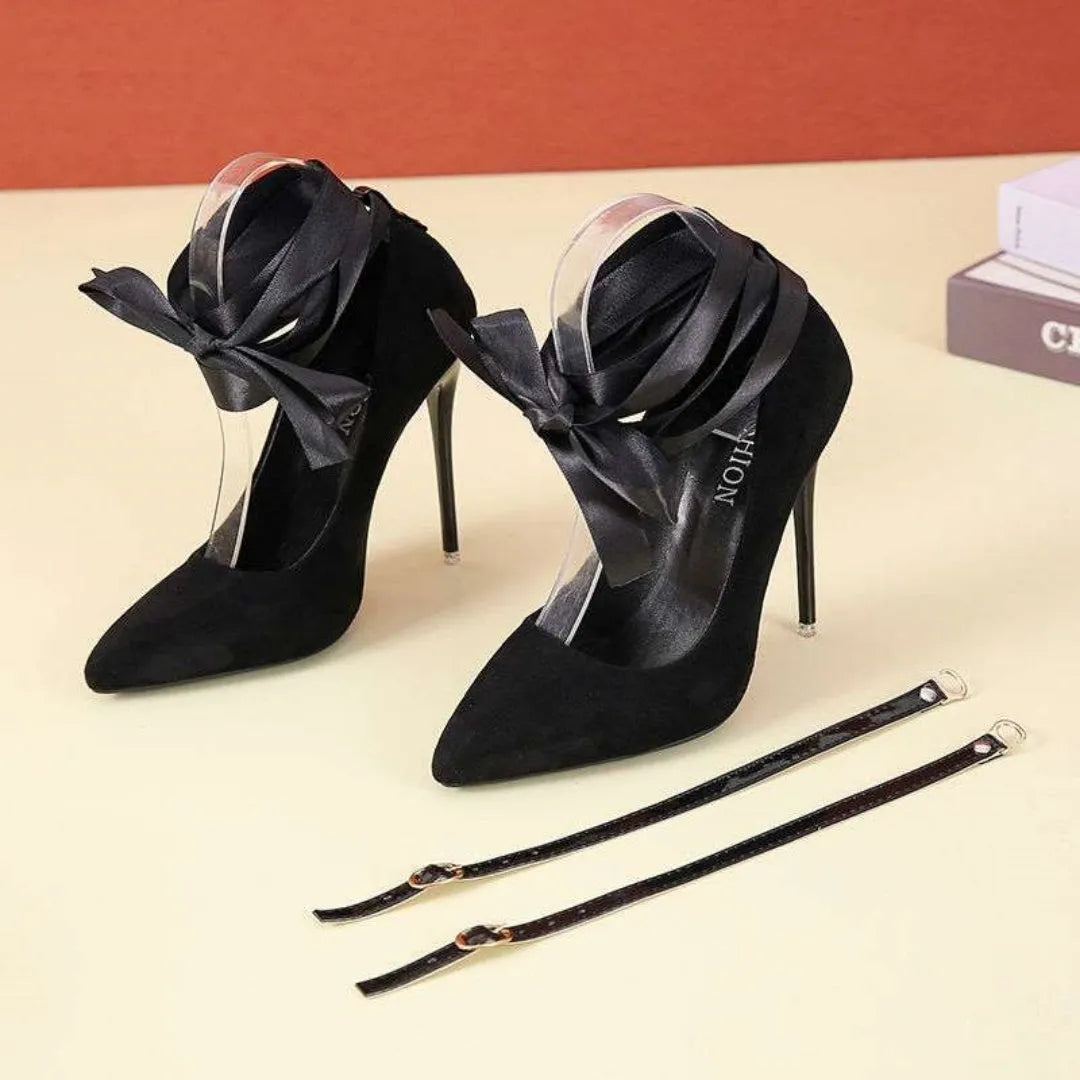 Women's black pointed toe stiletto pumps with shallow mouth design and fabric strap