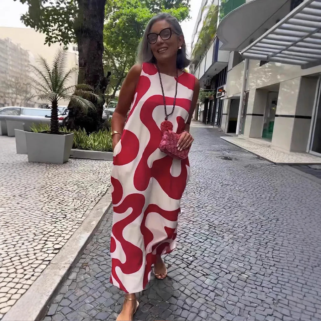 V-neck printed sleeveless dress in Rose Red with abstract pattern and A-line skirt for commuting style