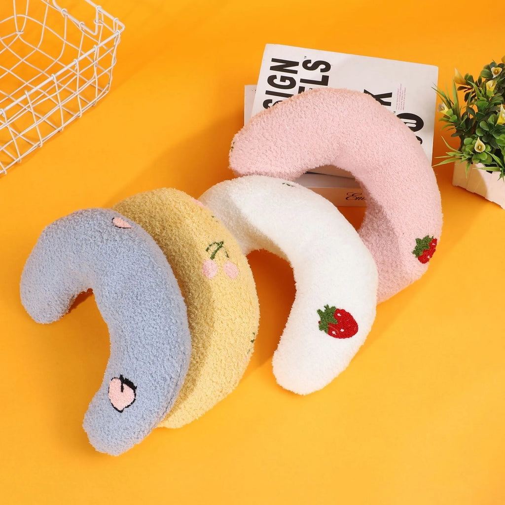 Cartoon half moon shaped U-shaped fabric pillow for cats in blue, pink, white, and yellow colour options