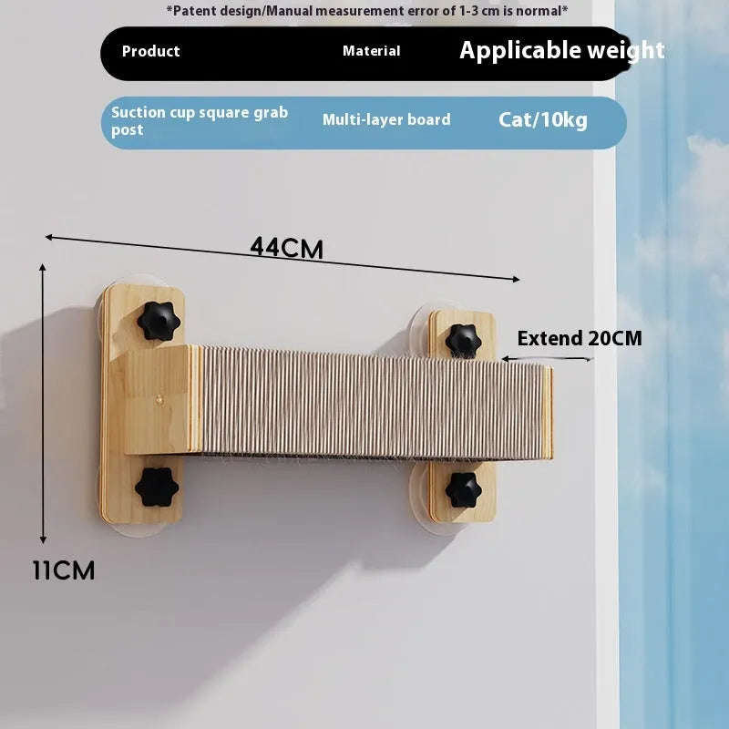 Space capsule style cat scratching climbing frame with sisal material attached to wall by suckers.