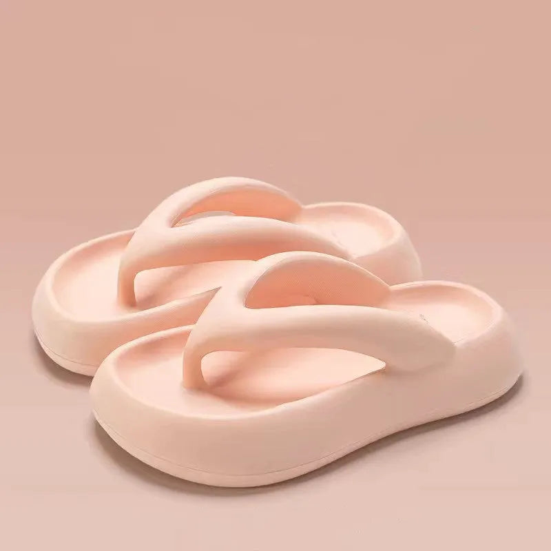 Solid colour thick-soled EVA flip-flops with a bow on the strap, shown on a white background.