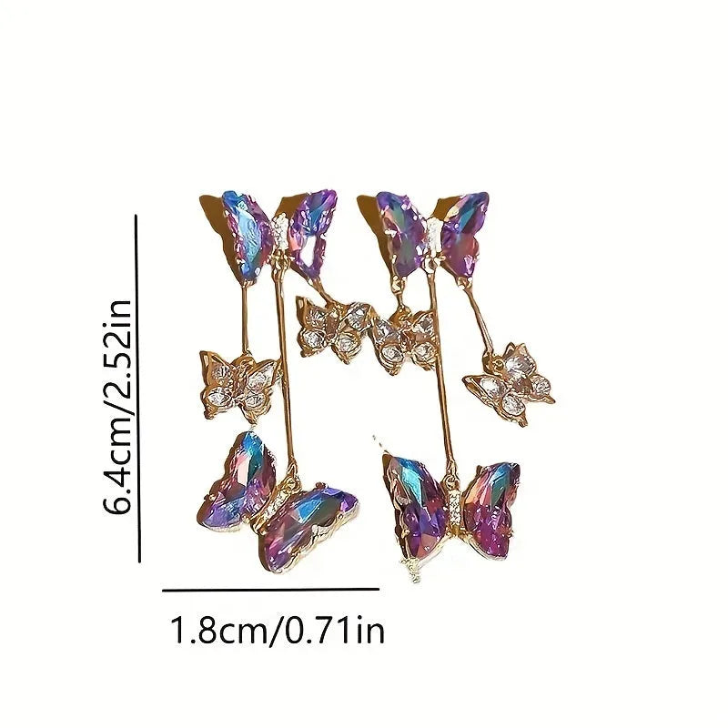 Silver electroplated butterfly tassel earrings with blue-purple crystal flowers on alloy base