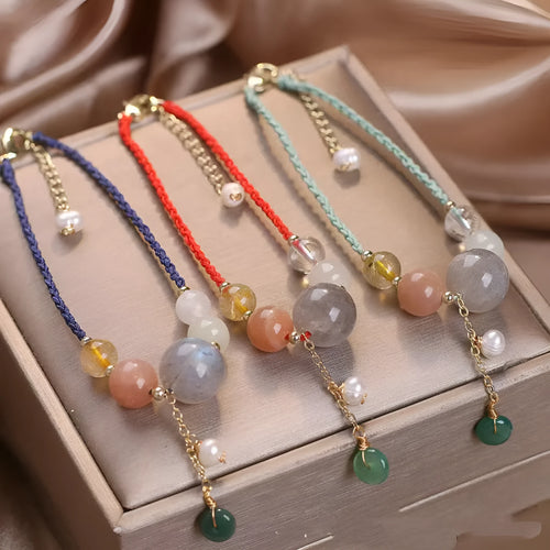 Hand-woven crystal bracelet with sequin details and adjustable buckle in three colour options
