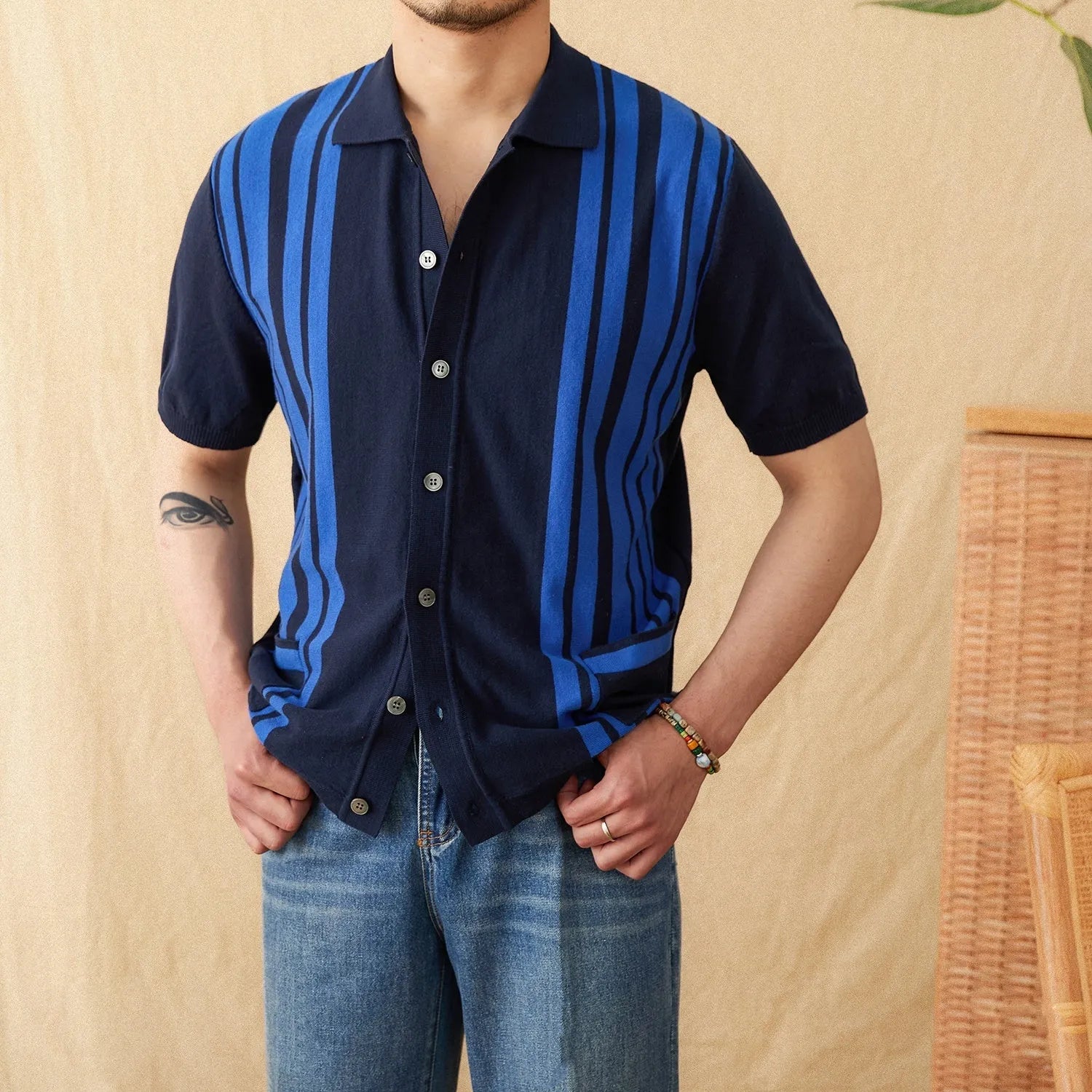 Cotton striped knitted cardigan polo shirt in light blue with lapel collar and short sleeves.