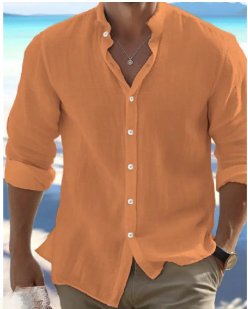 Men's long-staple cotton pullover shirt in light blue with collage stitching detail, laid flat.