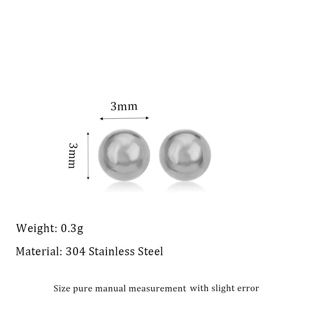 Stainless steel ball stud earrings in gold and silver finishes on a grey background.