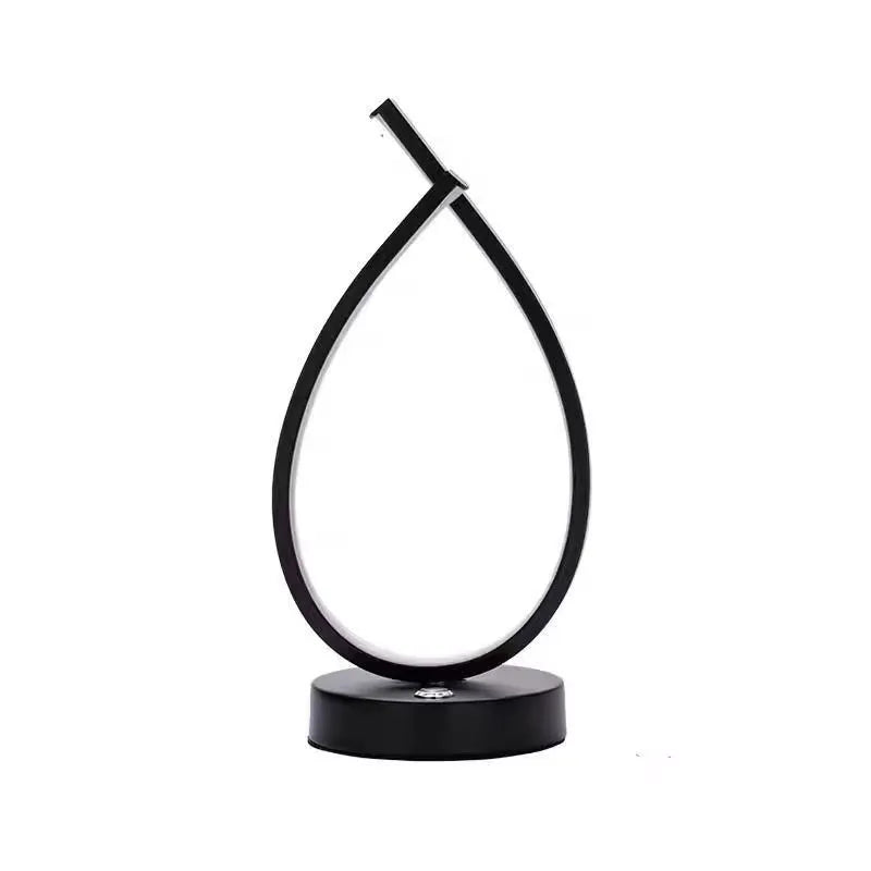 Water drop-shaped desk lamp in black or white with USB touch or mechanical switch measuring 30cm × 14cm