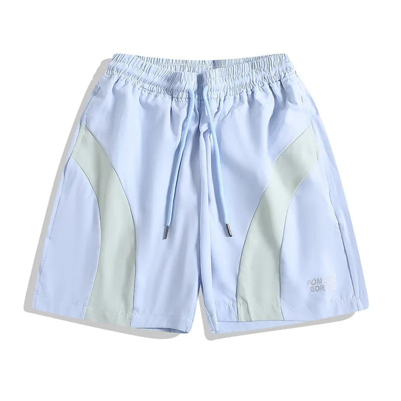 Black and grey quick-drying sports shorts with elastic waistband and loose fit for training