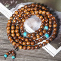 Handmade 108-bead lvzhu stone bracelet with 5-6mm geometric beads on wrist
