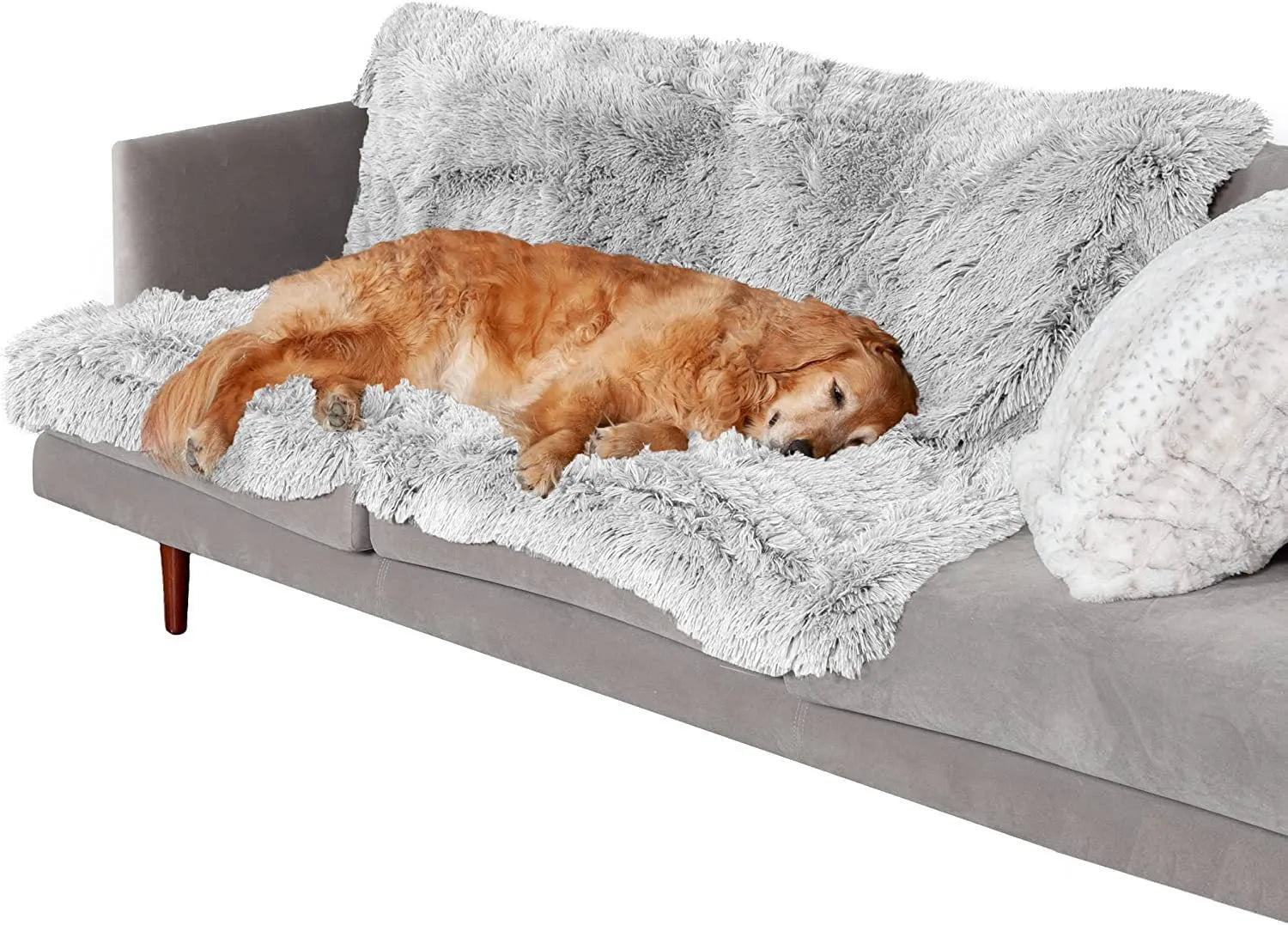Plush waterproof dog cushion in dark grey, shown in a large size on a wooden floor.