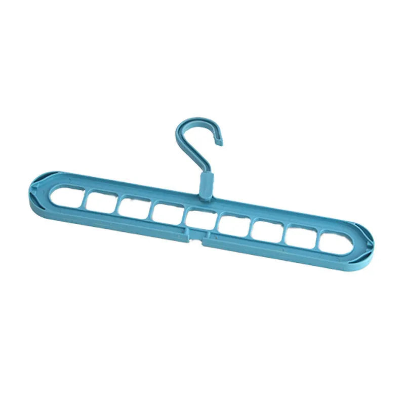 Green plastic nine-hole hanger folded flat showing multiple trouser hanging points
