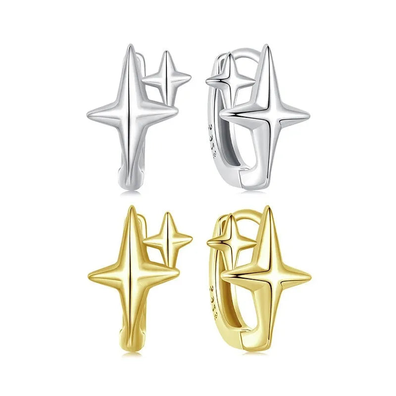 Minimalist oxidised sterling silver ear clips with geometric star designs