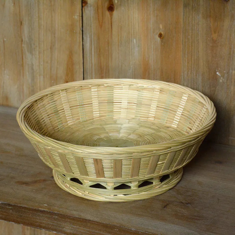 Handmade natural bamboo storage basket set showing three different sizes for household organisation