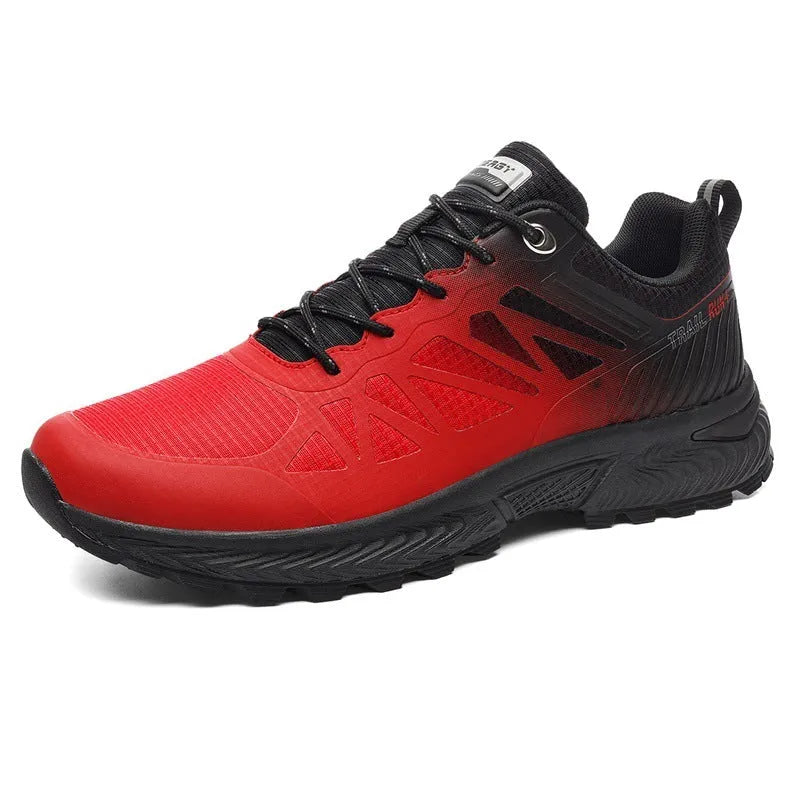 Men's black and orange breathable mesh running shoe with lace-up front and rubber sole