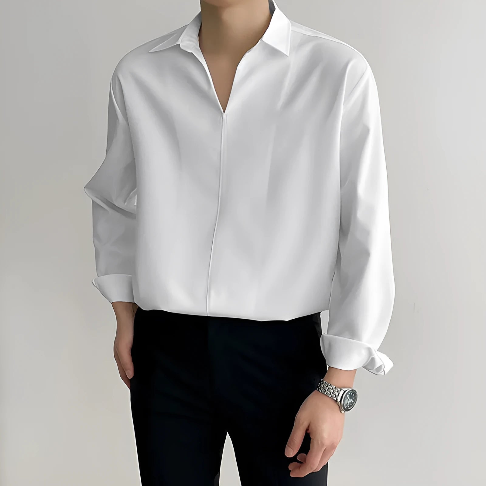 Men's loose lapel casual long sleeve shirt in solid colours on a hanger