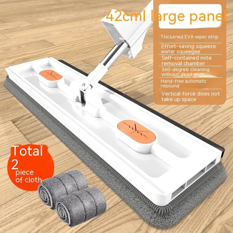 Large flat mop with blue cloth on a wooden floor, showing its 360-degree rotating head and long stainless steel handle.
