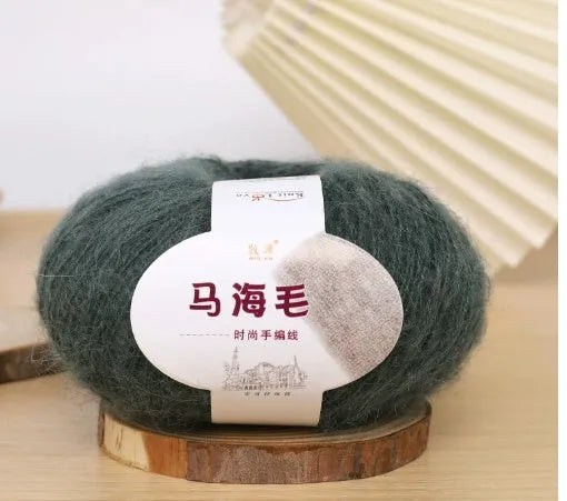 Mohair wool ball for DIY scarf knitting in assorted colours on white background