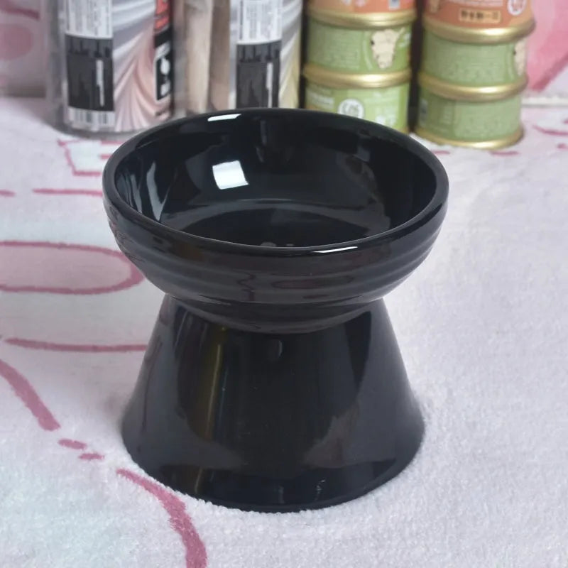 Black ceramic pet bowl with high foot and raised neck for dog or cat feeding