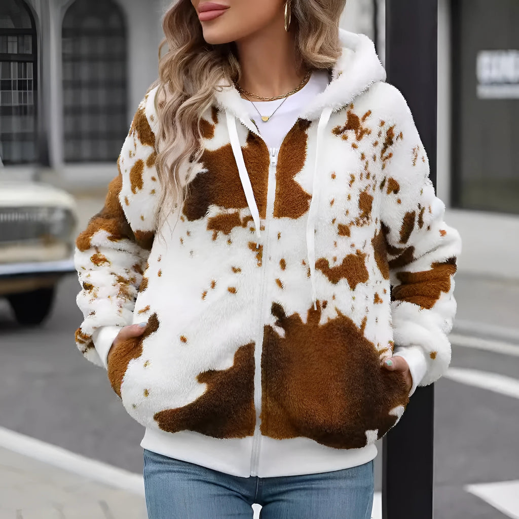 Yellow brown cow animal print pattern on a hooded zip-up cardigan jacket for casual street wear.