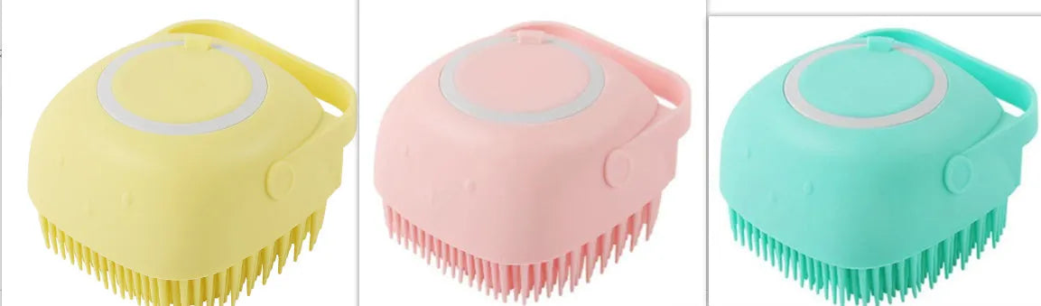 Blue silicone dog bath brush with handle for pet washing and massage during grooming