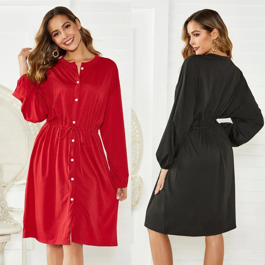 Women's black polyester dress with elastic waist, self-tie belt, and elastic cuffs on long sleeves
