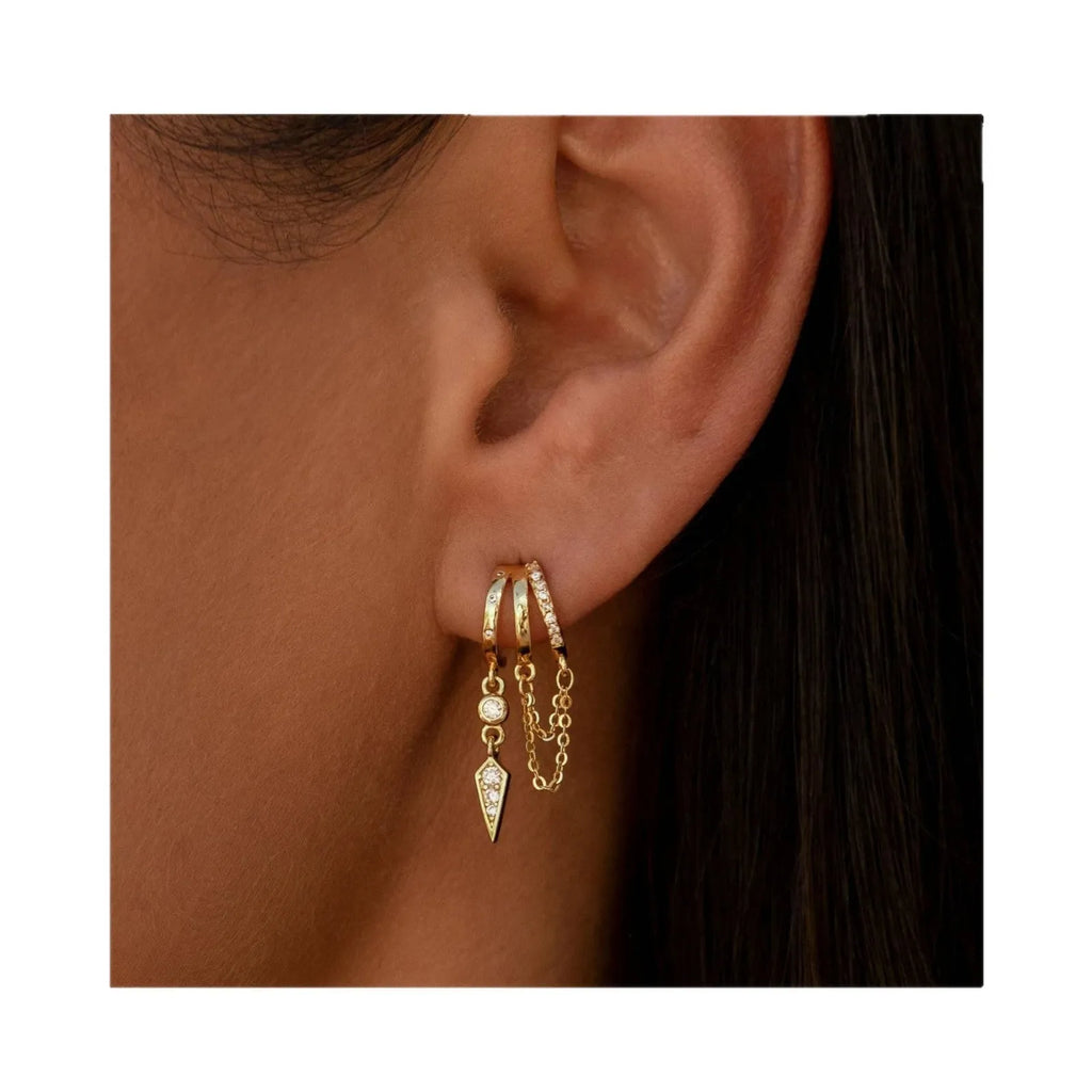 Brass gold plated chain tassel earring with copper base, one colour option shown against a neutral background.
