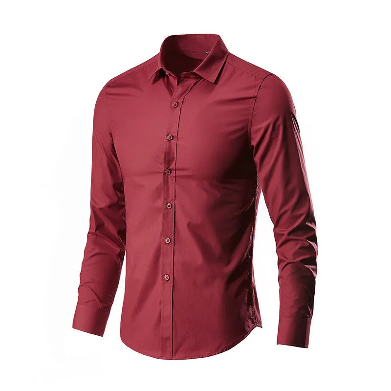 Man wearing a loose-fit linen long sleeve shirt in a neutral colour, showing the slim profile and button front.
