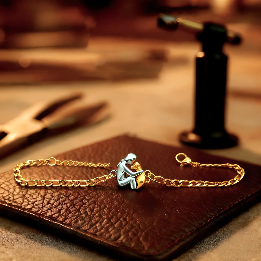Gold-plated copper women's bracelet in gold finish on plain background