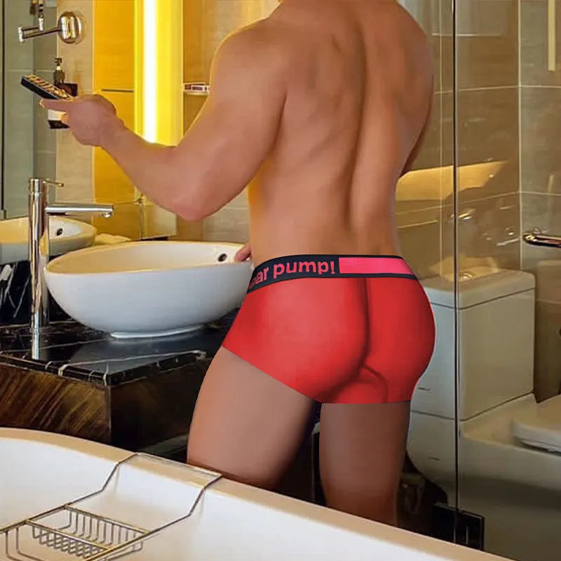 Men's black seamless low-waist underwear with a gradient laser design detail on the front.