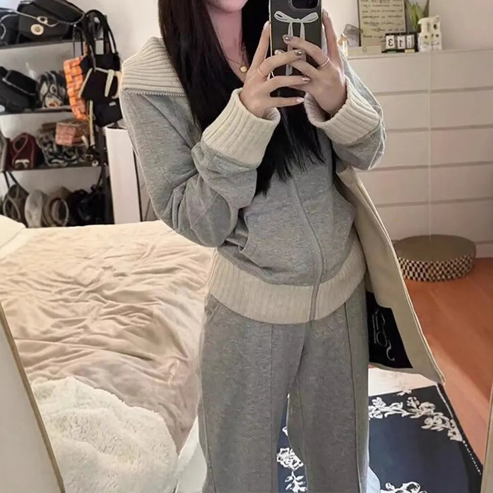 Light gray women's casual two-piece set with coat having pockets and wide leg trousers