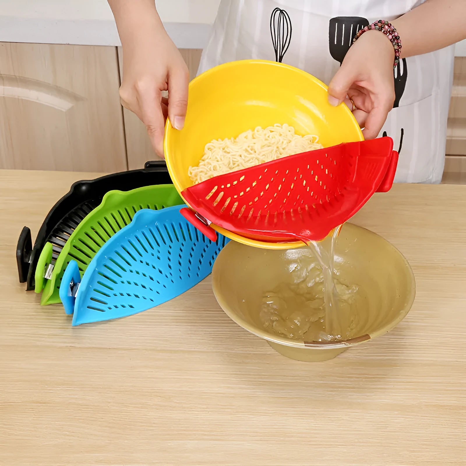 Silicone clip-on kitchen funnel strainer for draining liquids from pots with buckle attachment