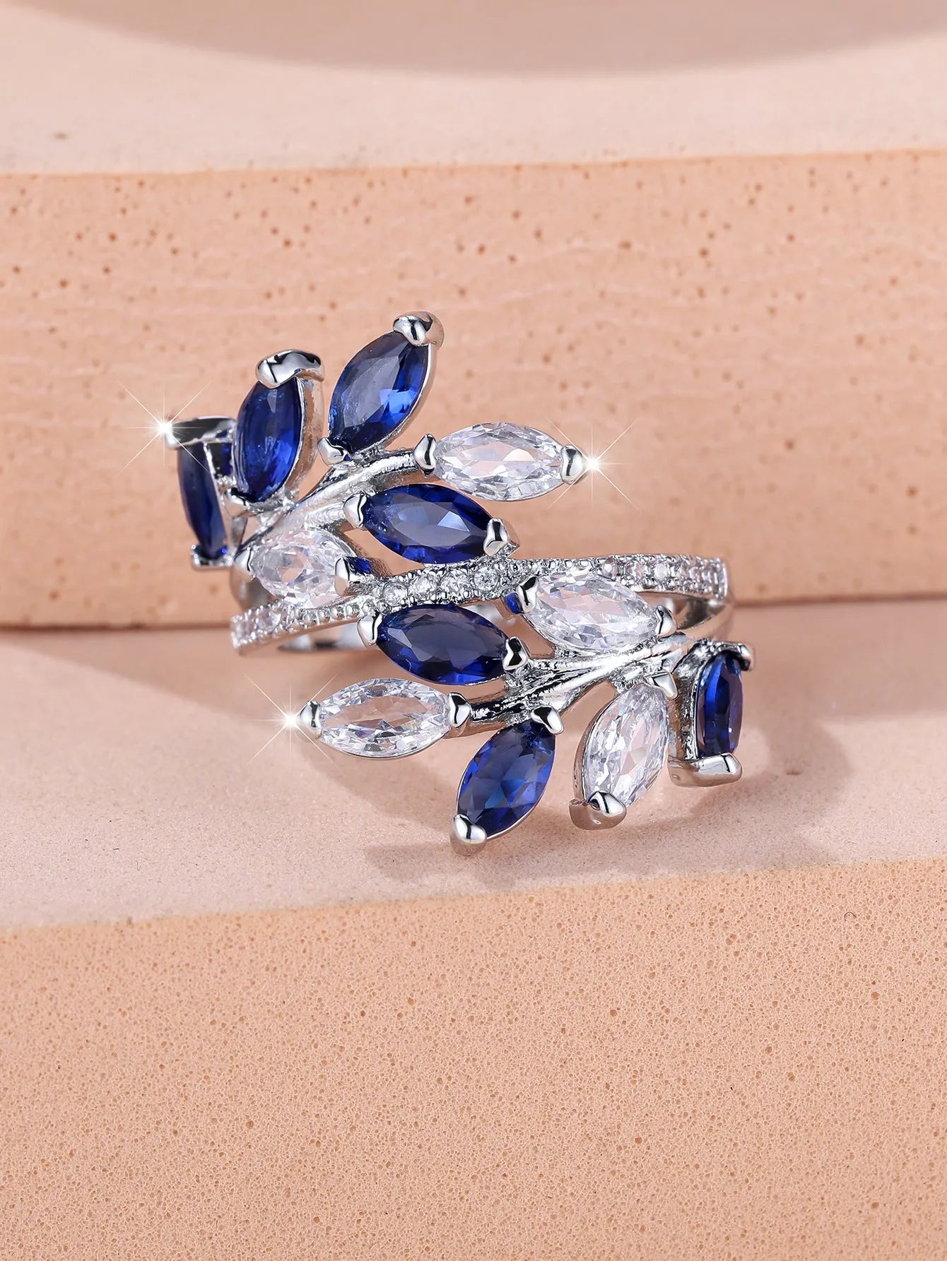 Adjustable copper ring with horse eye zircon stone and leaf design in multiple colour finishes